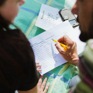 Two people having a legal document and made discussion - Sexton Weldon Law Firm.