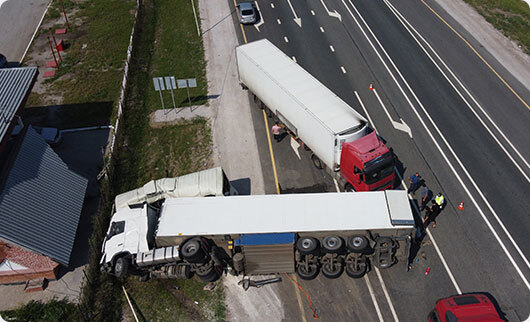 Two 18-Wheelers after an accident - Sexton Weldon Law Firm.